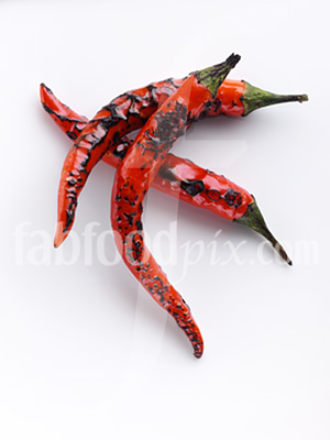 Flamed Chili peppers photo